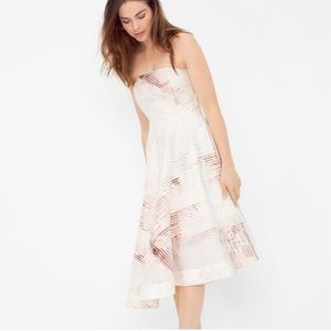 Asymmetrical strapless cocktail dress